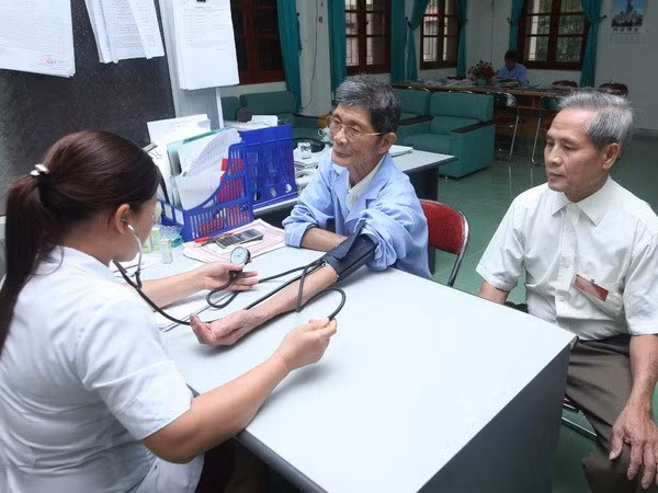 Cần thuận tiện hơn trong chi trả chính sách hỗ trợ người có công ảnh 1