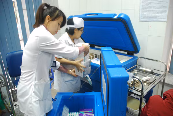 Ngày đầu tiêm vắc xin đăng ký qua mạng tại Hà Nội ảnh 10