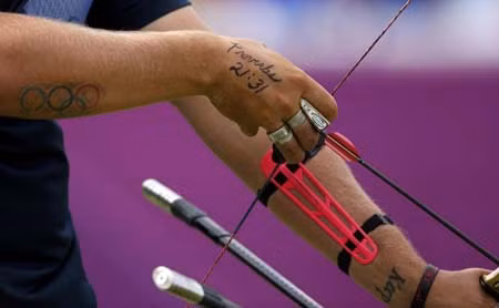 Vận động viên Olympic khoe hình xăm ảnh 9