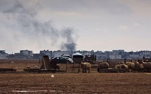 Kobane: Những bức ảnh từ mặt trận chống IS ảnh 10