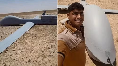 Dân Iraq selfie bên xác máy bay không người lái Mỹ ảnh 1