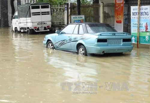 Mưa lớn, nhiều nơi ở tỉnh Khánh Hòa ngập lụt ảnh 1