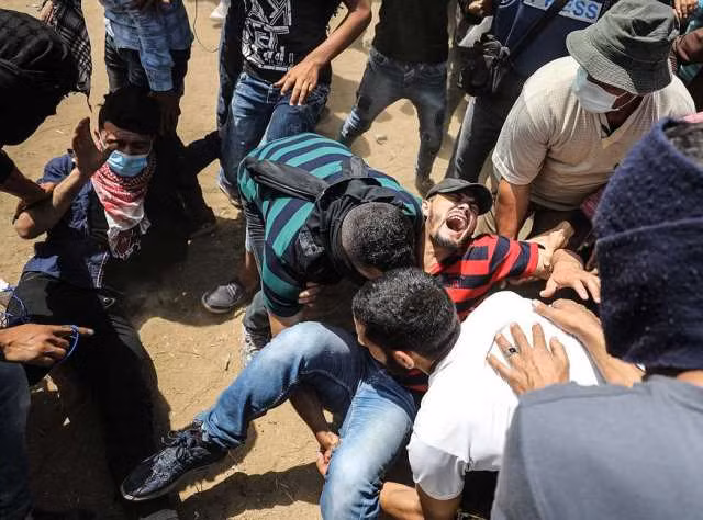 Gaza mịt mù khói lửa trong ngày 'đẫm máu' nhất 4 năm qua ảnh 9