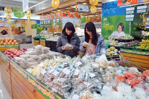 CPI tháng Tết giảm do tác động giá xăng dầu ảnh 1