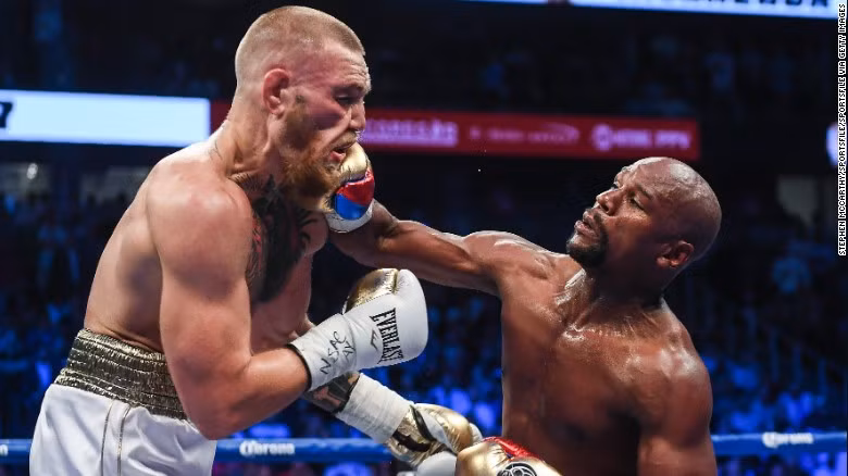 Kết quả trận đấu tỉ đô: 'Độc cô cầu bại' làng quyền anh hạ knock-out biểu tượng MMA ảnh 1