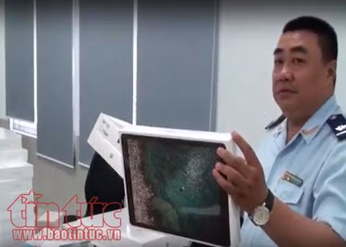 Bắt vụ nhập lậu hàng trăm Iphone, Ipad qua đường chuyển phát nhanh ảnh 2
