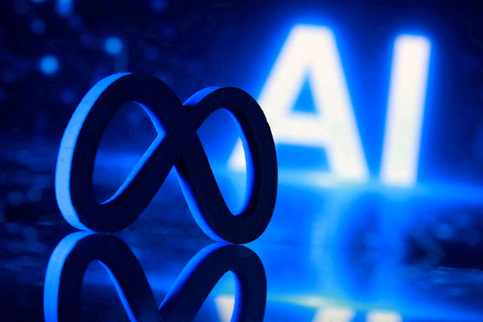 Logo Meta và chữ "AI" được in 3D. Ảnh: Reuters