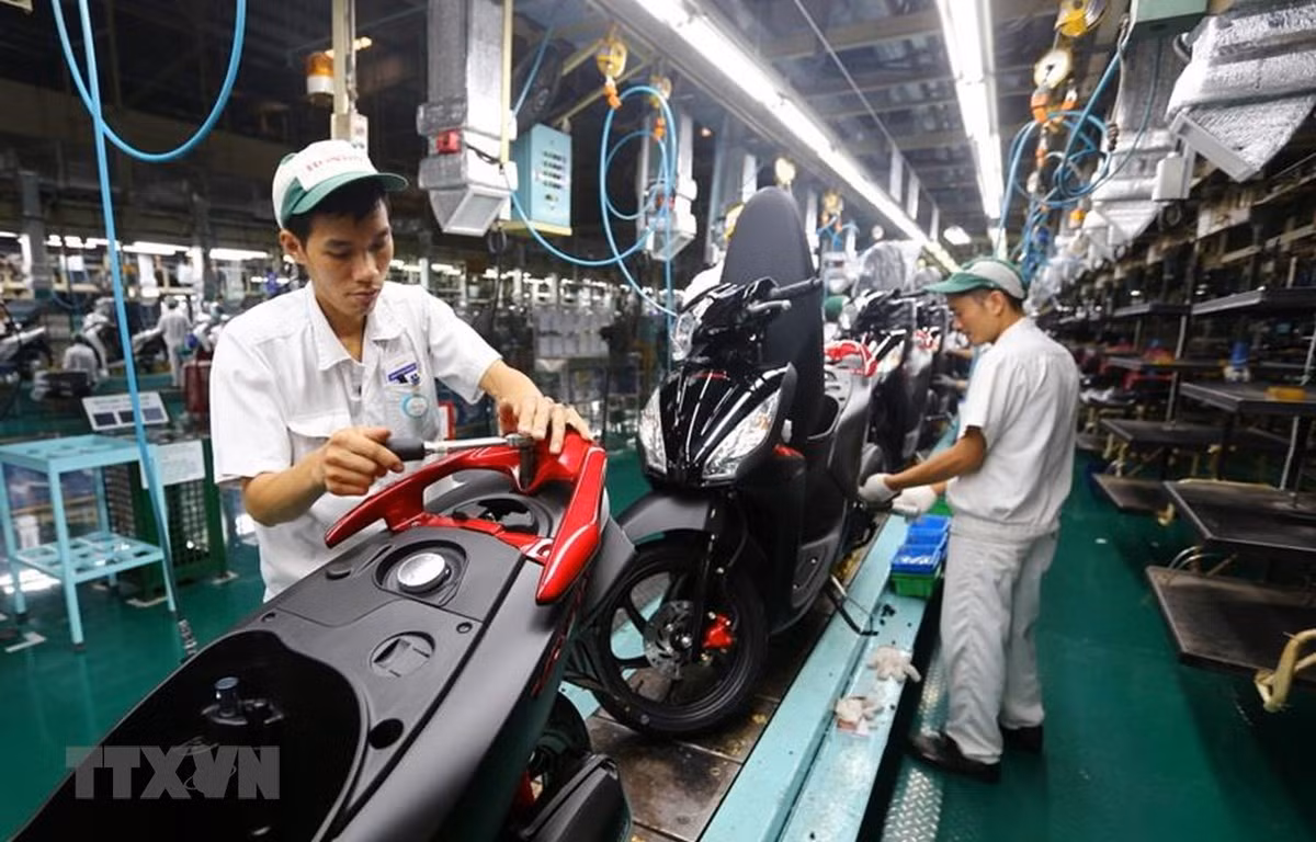 Dây chuyền lắp ráp xe gắn máy tại Công ty TNHH Honda Việt Nam, vốn đầu tư của Nhật Bản tại Vĩnh Phúc. Ảnh tư liệu: Danh Lam/TTXVN