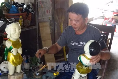 Cống hiến hết mình cho nghệ thuật múa rối nước ảnh 1