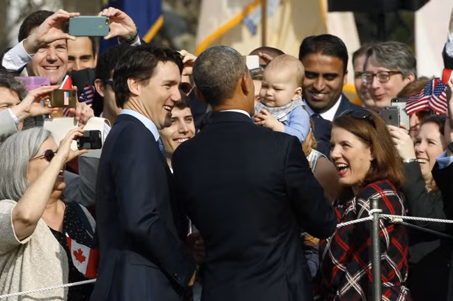 Tình cảm nồng ấm giữa ông Obama và Thủ tướng Canada gây sốt ảnh 10