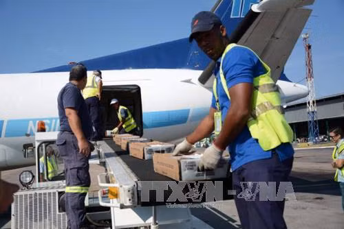 Cuba đón những bưu kiện đầu tiên từ Mỹ sau 50 năm ảnh 1