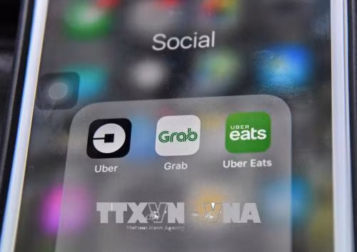 Grab thâu tóm Uber: Cần hoàn thiện khung khổ pháp luật để bảo vệ người tiêu dùng ảnh 1