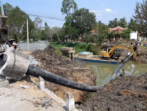 Tân Phú Đông chật vật đối phó hạn, mặn ảnh 1