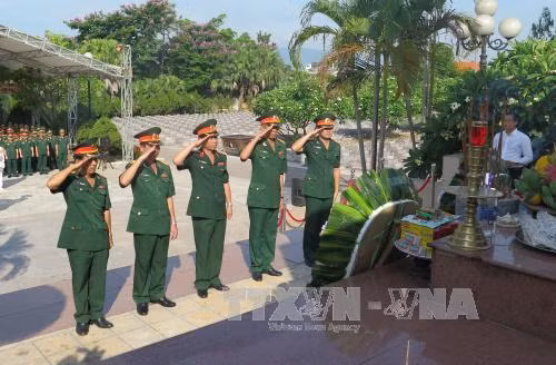 Truy điệu, an táng hài cốt liệt sĩ quân tình nguyện Việt Nam ảnh 2