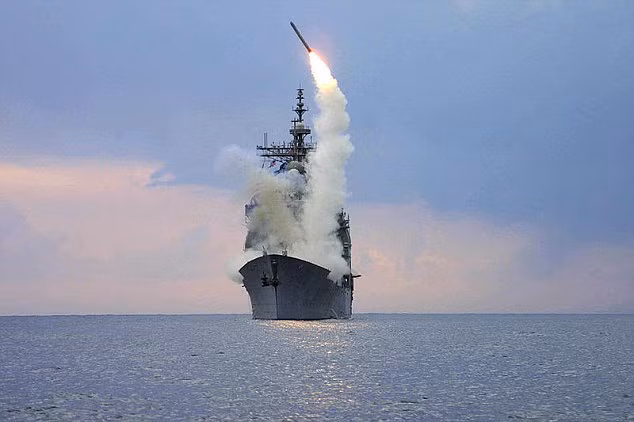 Xem tàu chiến Mỹ phóng Tomahawk vào lãnh thổ Syria ảnh 9