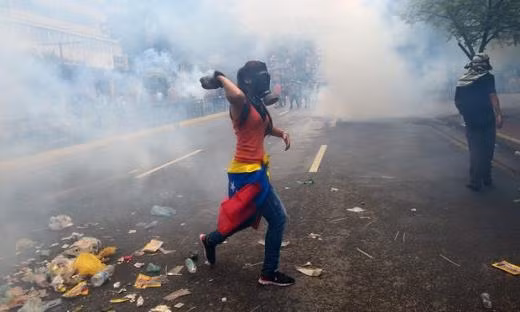 Phe đối lập tiếp tục biểu tình gây bạo loạn tại Venezuela ảnh 1