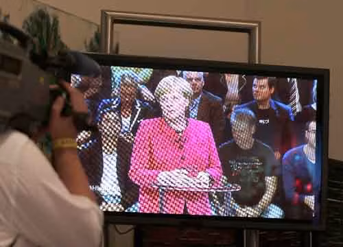 Eurozone lo lắng dõi theo bầu cử Đức ảnh 1