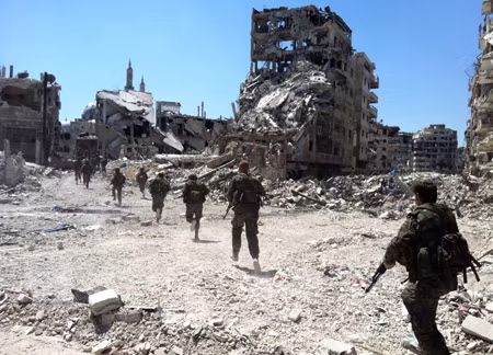 Quân chính phủ Syria giành lại nhiều ngôi làng ở Homs ảnh 1