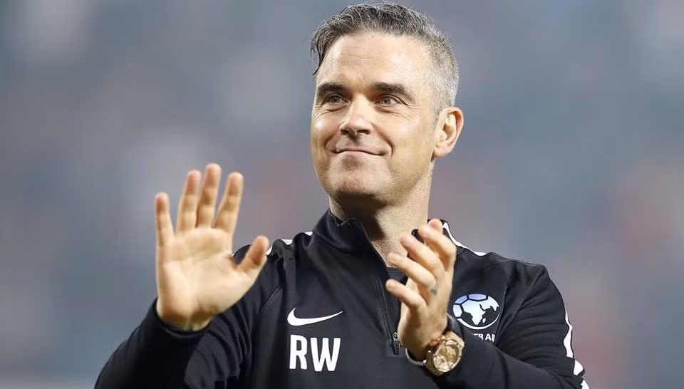 Danh ca nhạc pop Robbie Williams.