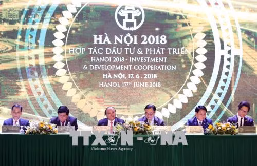 Thủ tướng Nguyễn Xuân Phúc dự Hội nghị 'Hà Nội 2018 - Hợp tác đầu tư và phát triển' ảnh 1