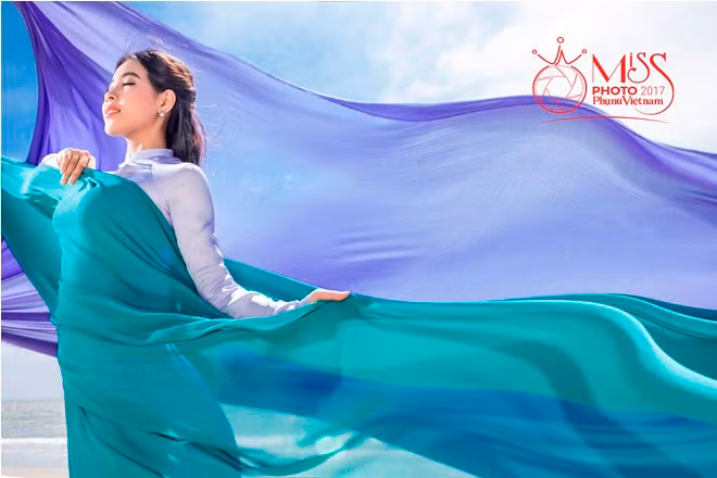 Ngắm vẻ đẹp thanh khiết của thí sinh Miss Photo cùng áo dài trước biển ảnh 19