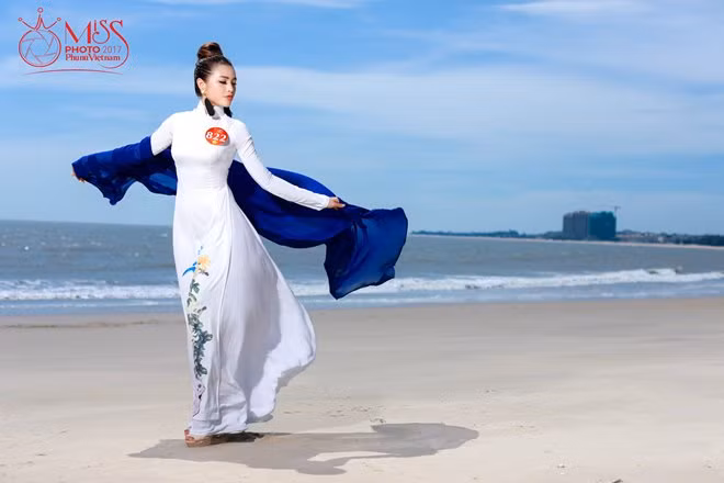 Ngắm vẻ đẹp thanh khiết của thí sinh Miss Photo cùng áo dài trước biển ảnh 10