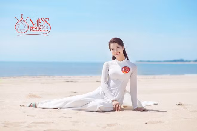 Ngắm vẻ đẹp thanh khiết của thí sinh Miss Photo cùng áo dài trước biển ảnh 11
