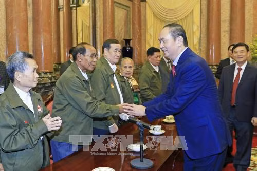 Chủ tịch nước gặp mặt đại biểu công dân Lào có công với cách mạng Việt Nam ảnh 1