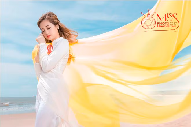 Ngắm vẻ đẹp thanh khiết của thí sinh Miss Photo cùng áo dài trước biển ảnh 5