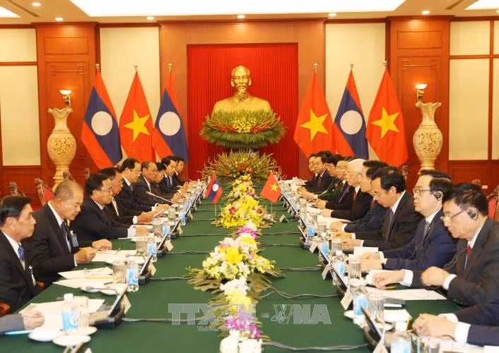 Lễ đón trọng thể Tổng Bí thư, Chủ tịch nước Lào Bounnhang Vorachith ảnh 3