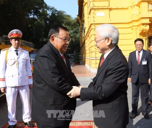 Lễ đón trọng thể Tổng Bí thư, Chủ tịch nước Lào Bounnhang Vorachith ảnh 1