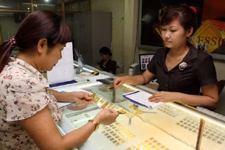 Nguyên nhân giá vàng bấp bênh ảnh 1