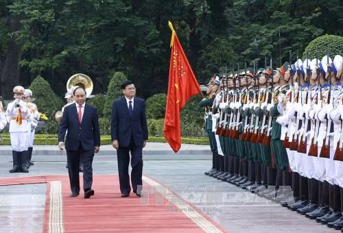 Chủ tịch nước Trần Đại Quang tiếp Thủ tướng Lào ảnh 2