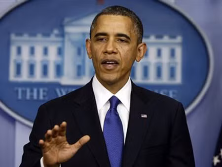 Tổng thống Obama ký ban hành luật cho phép chính phủ vay tiền ảnh 1