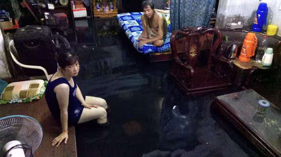 TP Hồ Chí Minh lại ngập nặng do triều cường và mưa lớn ảnh 7
