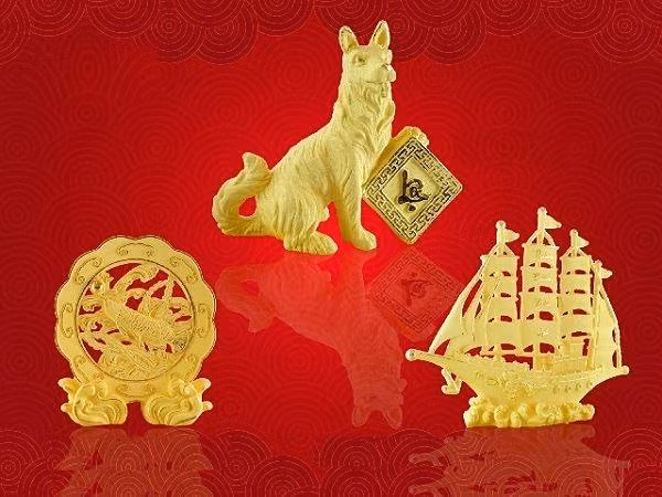 Sản phẩm vàng hình linh vật năm Tuất đắt hàng ngày vía Thần Tài ảnh 1