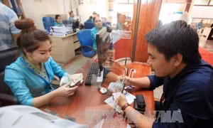 Nới biên độ tỷ giá là kịp thời và nhạy bén với thị trường 