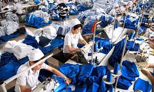 Đối phó với áp lực tỷ giá VND