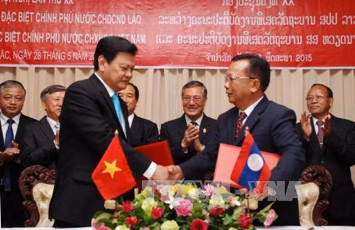 Việt-Lào hợp tác tìm kiếm hài cốt liệt sĩ hy sinh tại Lào ảnh 1