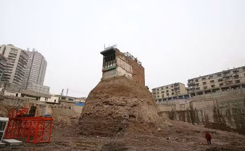 Nhà dân không chịu di dời ‘trơ lì’ giữa phố ảnh 5