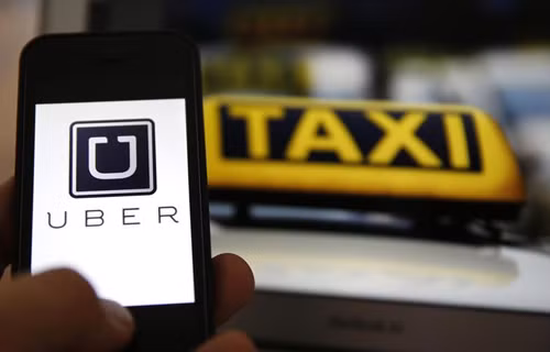 Pháp cấm dịch vụ Taxi Uber ảnh 1