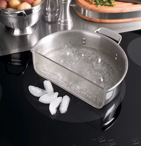 Phải làm sao với xoong, chảo inox mà bếp từ không nhận? ảnh 1