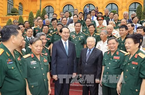 Chủ tịch nước Trần Đại Quang gặp mặt cựu Quân nhân tình nguyện giúp Campuchia ảnh 1