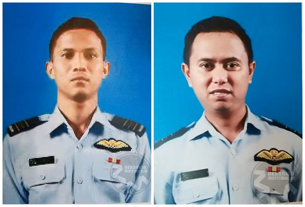 Malaysia phát hiện thi thể 2 phi công máy bay mất tích quấn trong dù ảnh 1