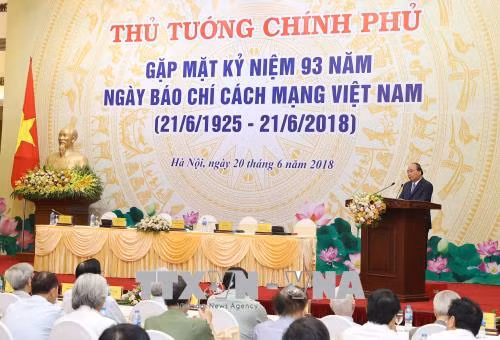 Chùm ảnh: Thủ tướng Nguyễn Xuân Phúc gặp mặt các cơ quan thông tấn, báo chí ảnh 5
