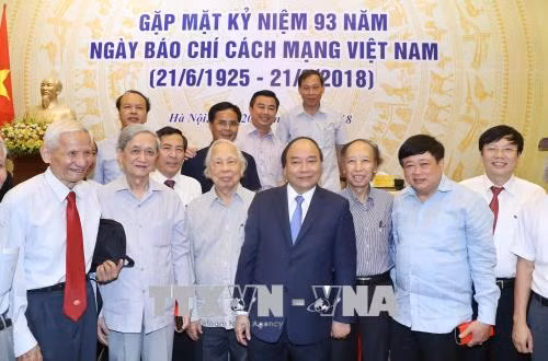 Chùm ảnh: Thủ tướng Nguyễn Xuân Phúc gặp mặt các cơ quan thông tấn, báo chí ảnh 3