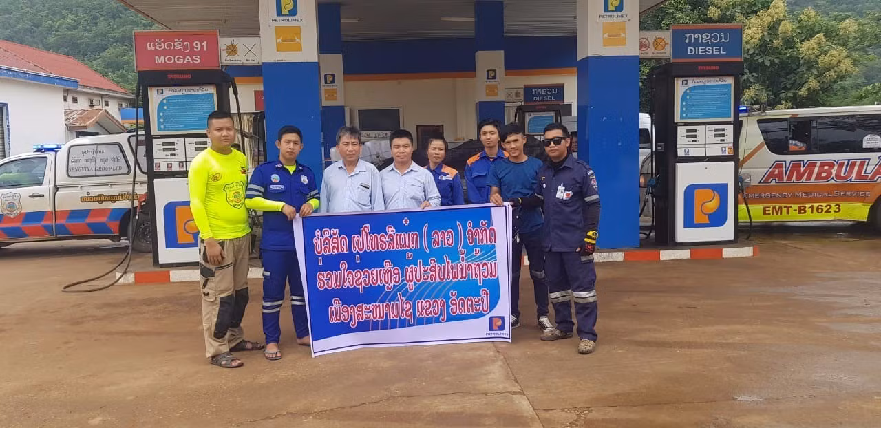 Petrolimex Lào hỗ trợ xăng dầu các xe cứu hộ vụ vỡ đập thủy điện ảnh 1