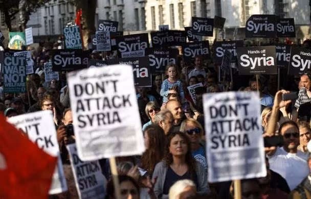 Khắp nơi phản chiến, ủng hộ Syria ảnh 3