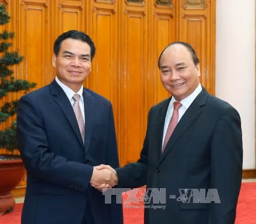 Thủ tướng tiếp Bộ trưởng Chủ nhiệm Văn phòng Thủ tướng Lào ảnh 1