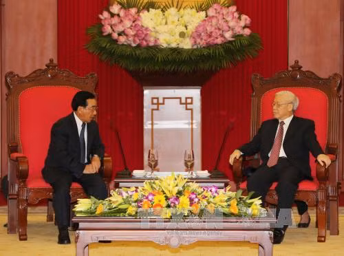 Tổng Bí thư tiếp Đoàn đại biểu cấp cao Đảng, Nhà nước Lào ảnh 1